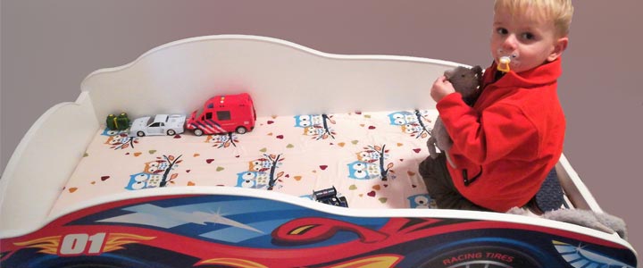 Van ledikantje naar raceautobed - wanneer gaat een dreumes over naar een peuterbedje Van ledikantje naar raceautobed - wanneer over naar een peuterbedje